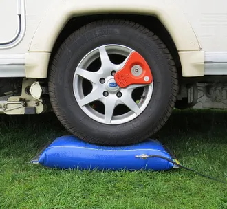 How do you level a motorhome on uneven ground?